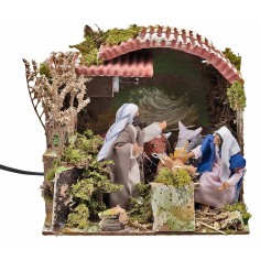 Hut with Nativity in motion and light 23x18x29 h