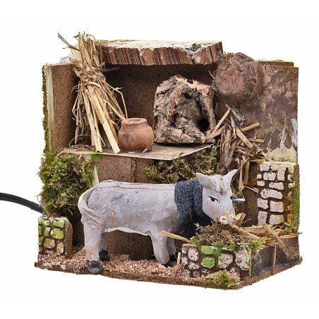 Burro al pesebre en movimiento