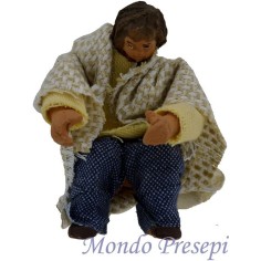 Niño sentado terracota vestido articulado Mundo Pesebres