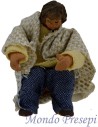 Bambino seduto terracotta vestito snodato