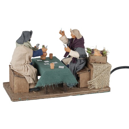 Card players seated 12 cm in motion