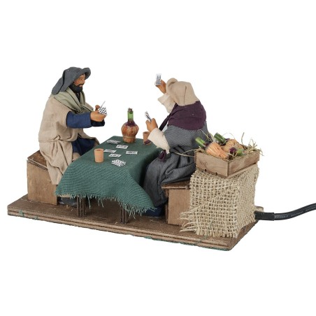 Card players seated 12 cm in motion