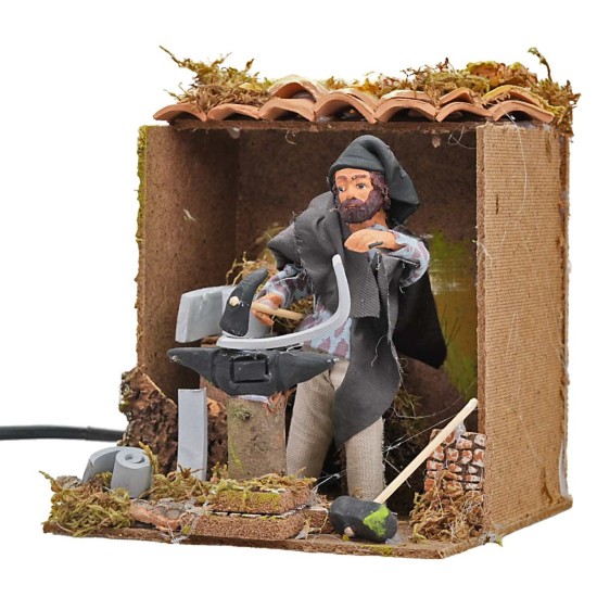 Fabbro cm 15 in movimento cm 17x17x19,5 h per presepe Mondo