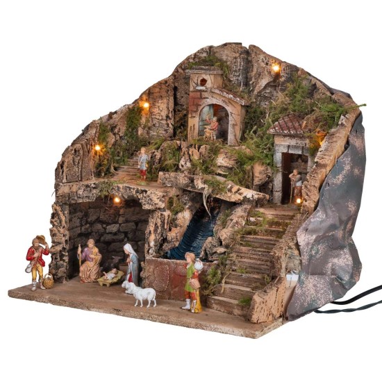 Illuminated nativity scene complete with waterfall and statues