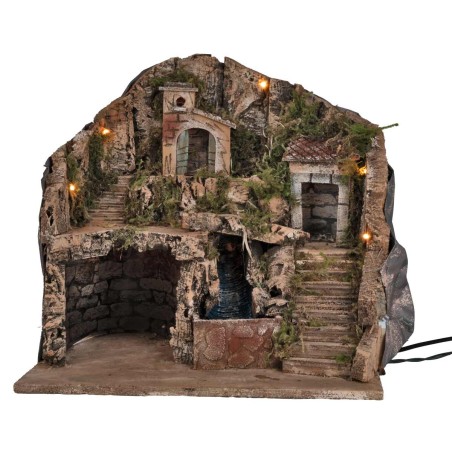 Handcrafted nativity scene with lights and waterfall, measuring 39x30x39 cm.