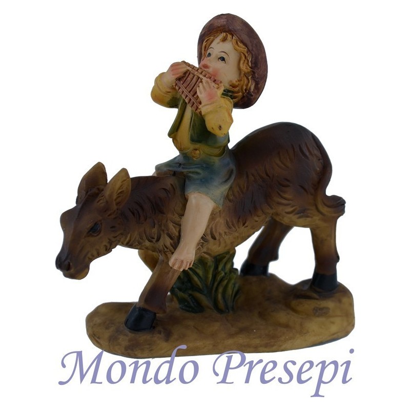 Child on a donkey cm 9 in resin