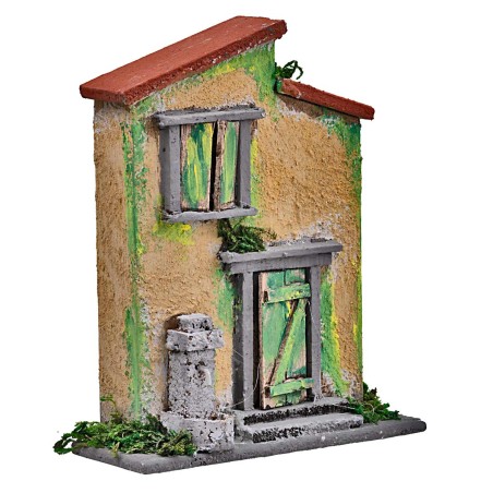 Yellow and green house with a small fountain for nativity scene, dimensions 10x4x12.5 cm (H).