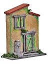 Yellow and green house with a small fountain for nativity scene, dimensions 10x4x12.5 cm (H).