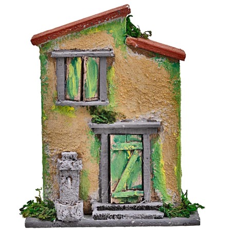 Yellow and green house with a small fountain for nativity scene, dimensions 10x4x12.5 cm (H).