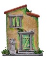 Yellow and green house with a small fountain for nativity scene, dimensions 10x4x12.5 cm (H).
