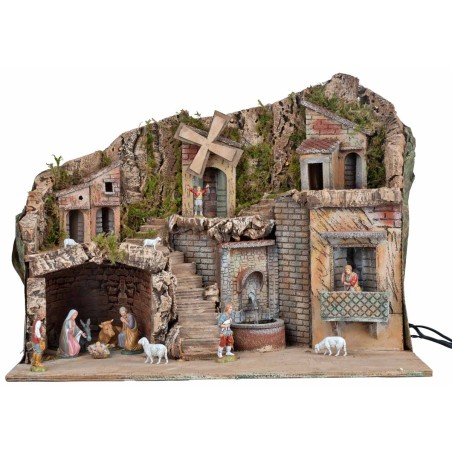 Illuminated nativity scene with mill and fountain 60x33x45cm complete with