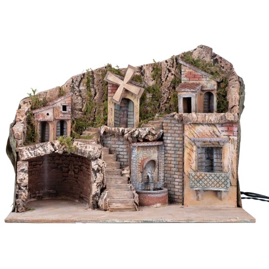 Illuminated nativity scene with a windmill and fountain powered