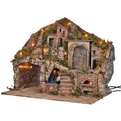 Pesebre iluminado con horno y cascada funcionando a corriente