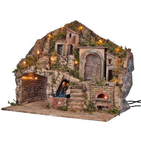 Illuminated nativity scene with electric oven and working waterfall