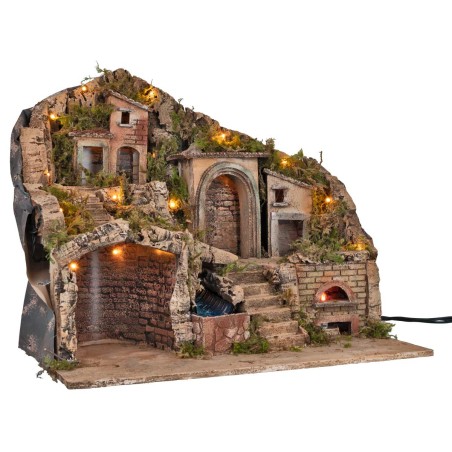 Illuminated nativity scene with electric oven and working waterfall