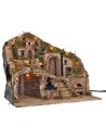 Illuminated nativity scene with electric-powered oven and working waterfall