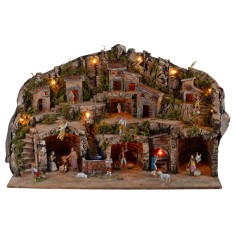 Pesebre iluminado con cuevas, casitas, arroyo y horno funcional 2