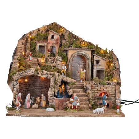 Illuminated nativity scene with an electric oven and waterfall