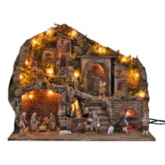 Illuminated nativity scene with electric-powered oven and waterfall 2