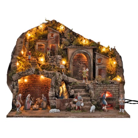 Illuminated nativity scene with an electric oven and waterfall
