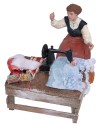 Banco da sarta con macchina e stoffe per statue 10 cm