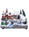Christmas village with moving sleigh complete with lights and