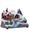 Christmas village with moving sleigh complete with lights and