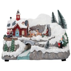 Pueblo de Navidad con trineo en movimiento completo de luces y