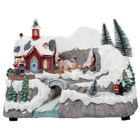 Christmas village with moving sleigh complete with lights and