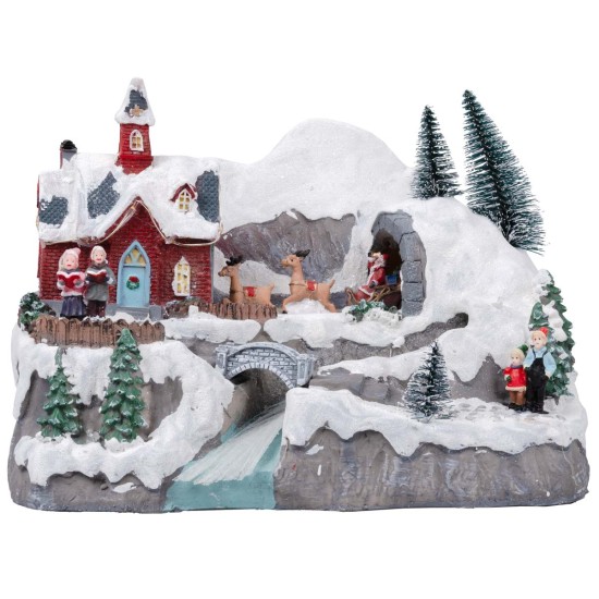 Christmas village with moving sleigh complete with lights and