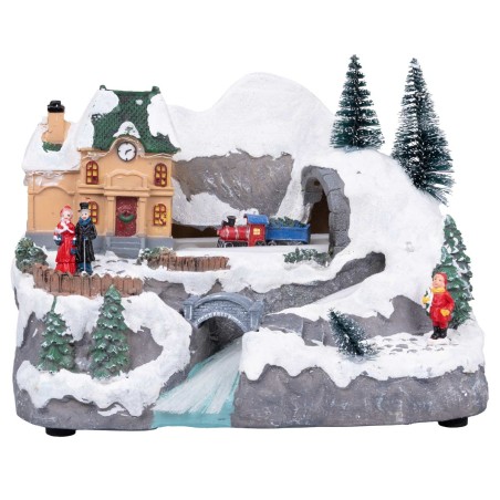 Christmas carousel with moving train and stream with house