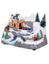 Christmas village with moving train equipped with lights and