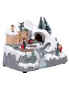 Christmas village with moving train equipped with lights and