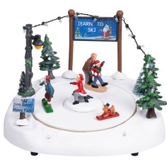 Christmas carousel with ice skating rink complete with lights and