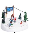 Christmas carousel with ice skating rink complete with lights and