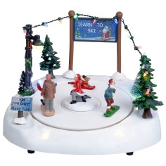 Ice rink with moving skiers complete with lights and music 2