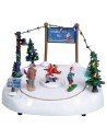 Ice rink with moving skiers complete with lights and music