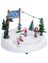 Ice rink with moving skiers complete with lights and music