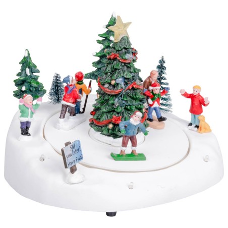 Giostrina natalizia con pista di pattinaggio e albero di natale