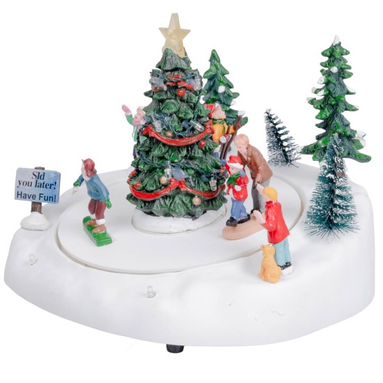 Ice skating rink with Christmas tree complete with light and