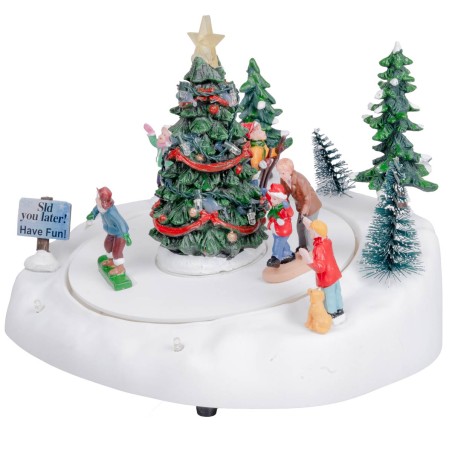Ice skating rink with Christmas tree complete with light and