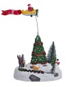 Christmas carousel with Santa Claus on moving airplane complete