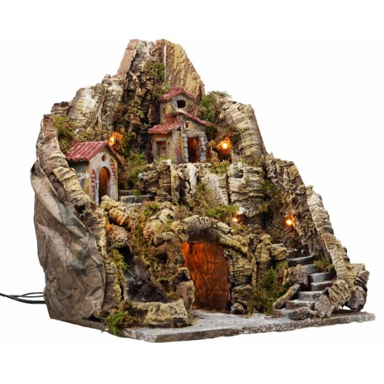 Illuminated nativity scene with a stream and long staircase