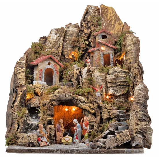 Illuminated nativity scene with a stream and long staircase