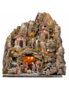 Illuminated nativity scene with a stream and long staircase