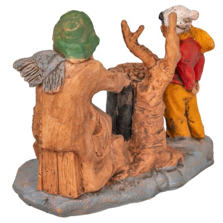 Castagnaro with child with base series 10 cm in PVC for nativity scene