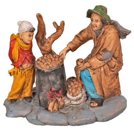 Castañero con niño con base serie 10 cm en PVC para belén