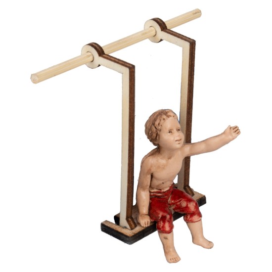 Bambino su altalena in legno serie 10 cm per presepe Mondo