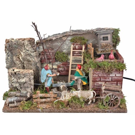 Pair of 10 cm moving lumberjacks with farm for nativity scene