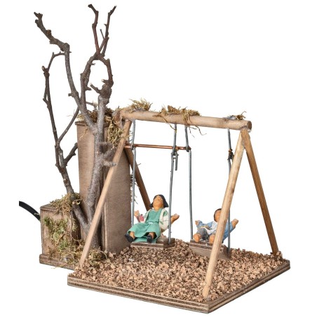 Pair of children on swing series 12 cm in motion for